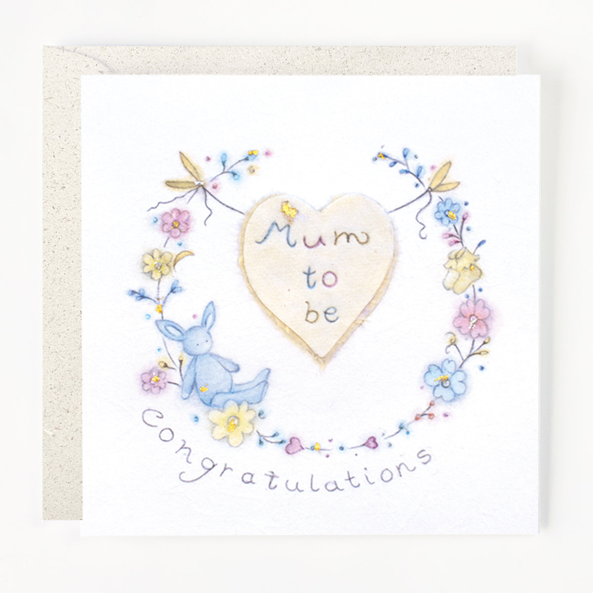A greeting card with 'Mum to Be' written in the center, surrounded by a floral design, with a 'Congratulations' message underneath.