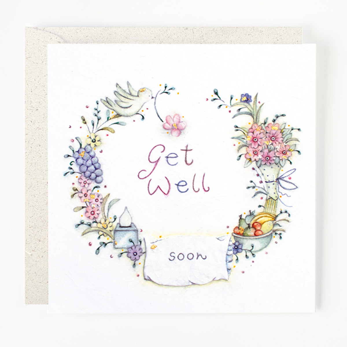 A greeting card with a floral wreath design and the text 'Get Well Soon' in the center.