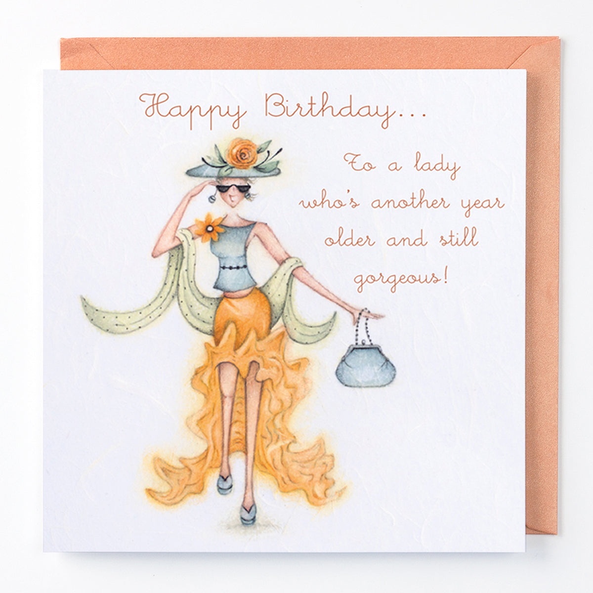 A greeting card with a floral pattern and a character illustration, with text that reads 'Happy Birthday to a lady who's another year older and still gorgeous!'.